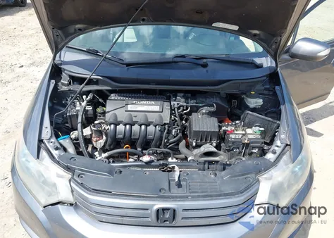 2011 Honda Insight Ex from USA, damaged, VIN JHMZE2H70BS008854